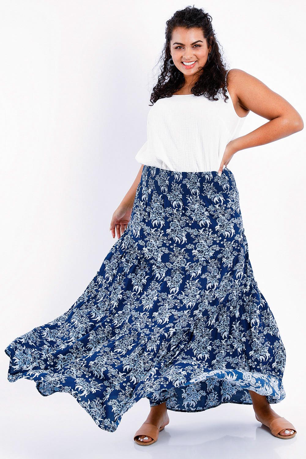 Model Sasha-Lee wearing size 16 of the Skirting Around The Garden Skirt in colour Bluefleur (Blue), from the front, showing the whole outfit