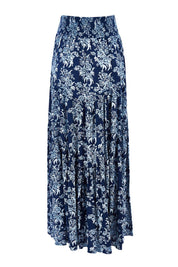 Product shot of the Skirting Around The Garden Skirt in colour Bluefleur (Blue), from the back