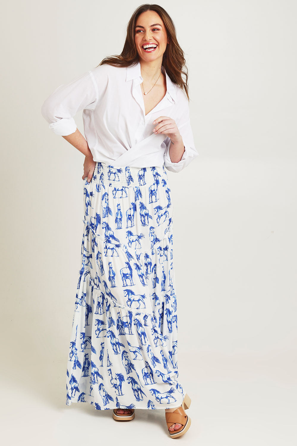 Model Jane wearing size 14 of the Skirting Around The Garden Skirt in colour Whitehorse (White), from the front, showing the whole outfit