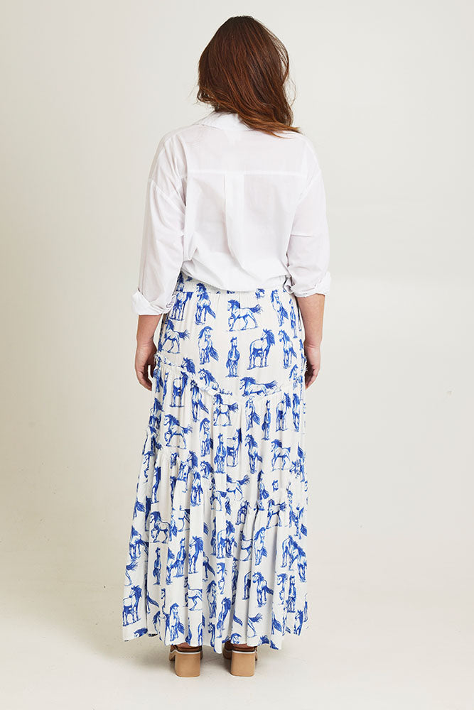 Model Jane wearing size 14 of the Skirting Around The Garden Skirt in colour Whitehorse (White), from the front, showing the whole outfit