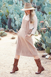 Model Marnee wearing size 10 of the My Cord Pinafore Dress in colour Camel, from the front, showing the whole outfit