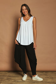 Model Madeline wearing size 10 of The Wanderer In Me Travel Pant in colour Black (Black), from the front, showing the whole outfit