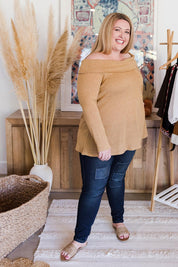 Model Sarah wearing size 20 of the Shine Bright Off The Shoulder Top in colour Gold (Metallics), from the front, showing the whole outfit
