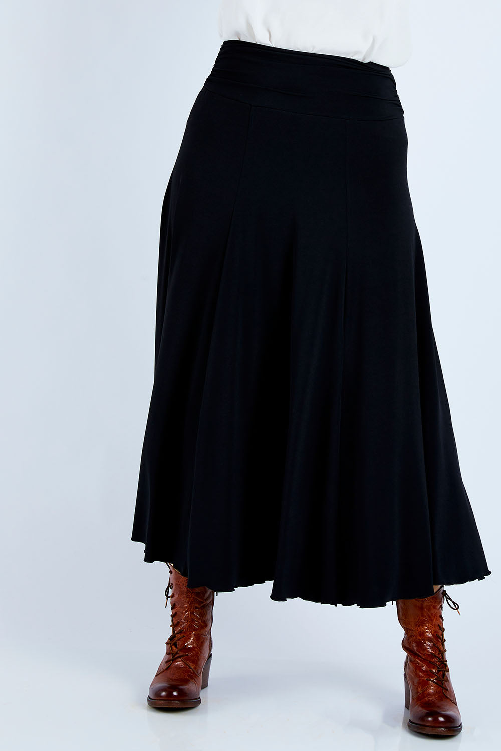 Model Jess wearing size 14 of The Wanderer In Me Travel Skirt in colour Black (Black), from the front, cropped image