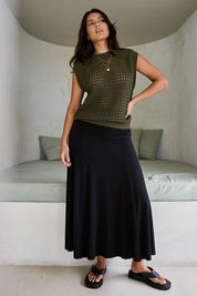 Model Tahnee wearing size 10 of The Wanderer In Me Travel Skirt in colour Black (Black), from the front, showing the whole outfit