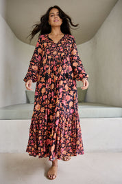 Model Tahnee wearing size 10 of the Its Better With You Dress in colour Black (Black), from the front, showing the whole outfit