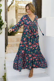 Model Tegan wearing size 10 of the Its Better With You Dress in colour Tealfleur (Blue), from the front, showing the whole outfit