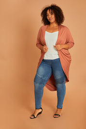 Model Alexis wearing size 16 of the Falling For You Bamboo Cardi in colour Copper, from the front, showing the whole outfit