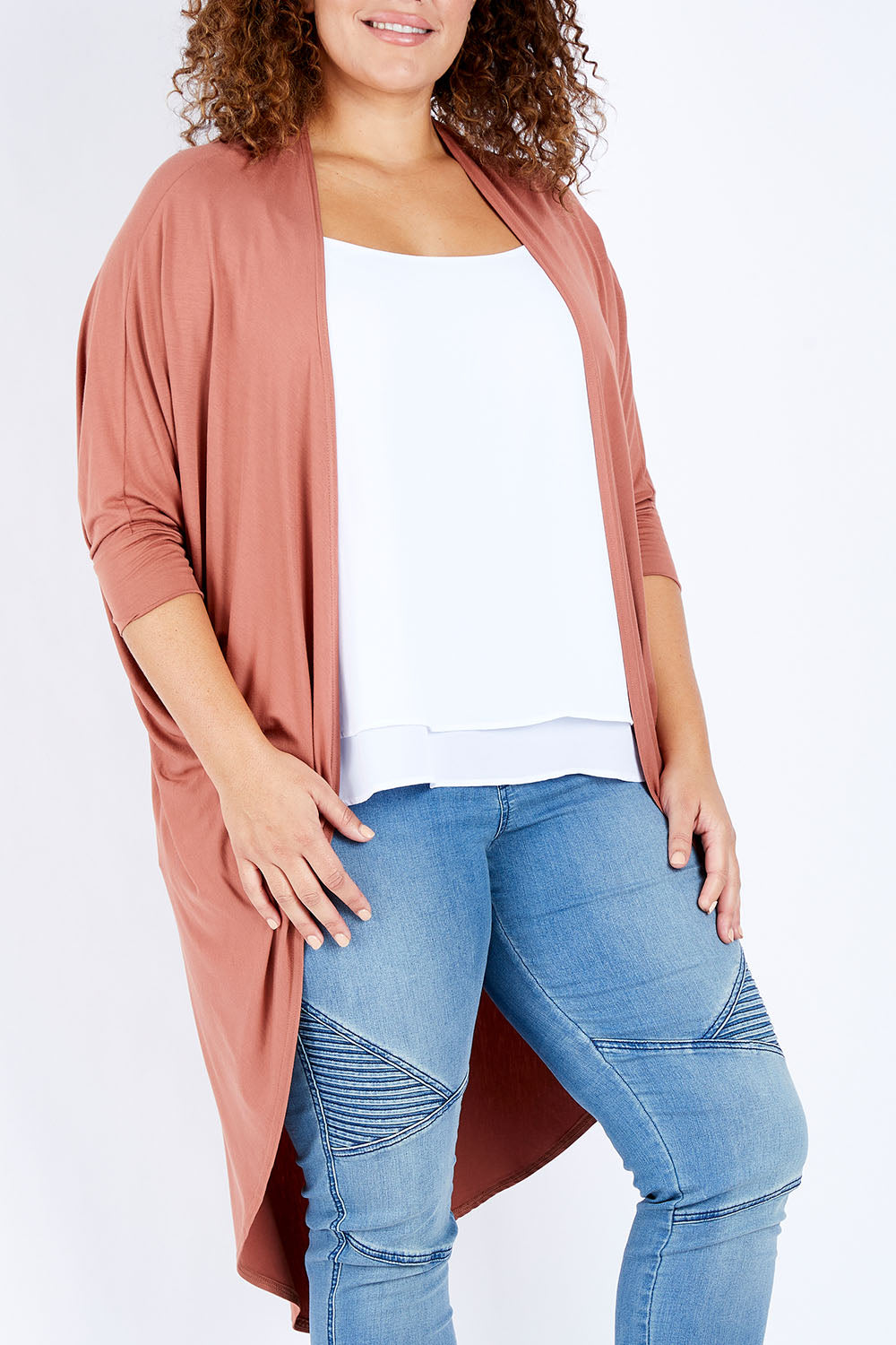 Model Jess wearing size 16 of the Falling For You Bamboo Cardi in colour Copper, from the front, cropped image