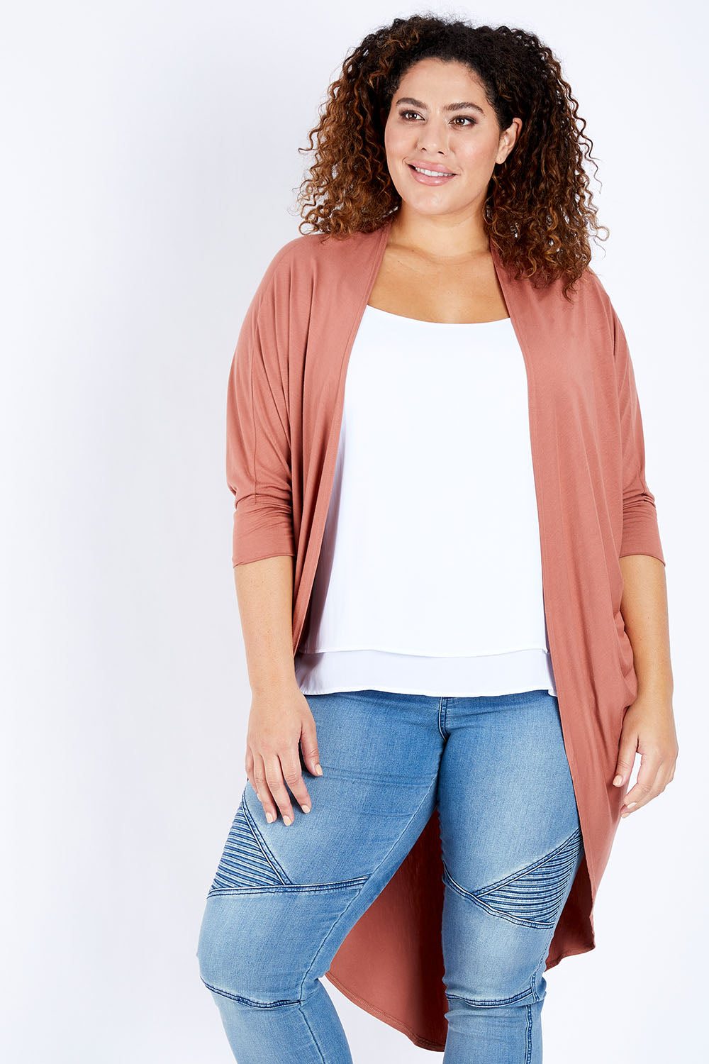 Model Jess wearing size 16 of the Falling For You Bamboo Cardi in colour Copper, from the front, cropped image
