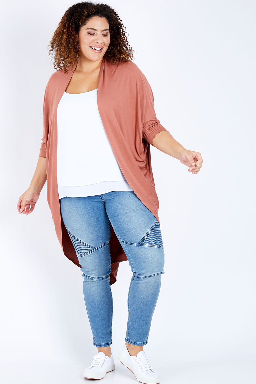Model Jess wearing size 16 of the Falling For You Bamboo Cardi in colour Copper, from the front, showing the whole outfit