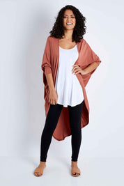 Model Pamela wearing size 10 of the Falling For You Bamboo Cardi in colour Copper, from the front, showing the whole outfit