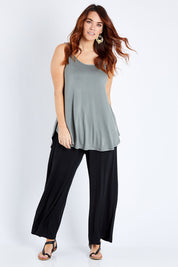 Model Laura wearing size 12 of the Softly Swinging Bamboo Pants in colour Black (Black), from the front, showing the whole outfit