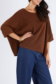 Model Gemma wearing size 10 of the Flow With Me Slouch Knit Top in colour Bark, from the front, cropped image