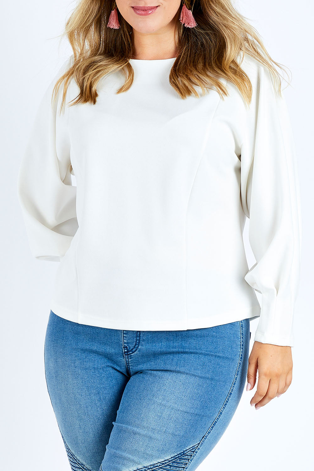 Model Jess wearing size 14 of the Its All In The Sleeve Top in colour Ivory (White), from the front, cropped image