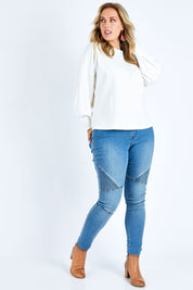 Model Jess wearing size 14 of the Its All In The Sleeve Top in colour Ivory (White), from the front, showing the whole outfit
