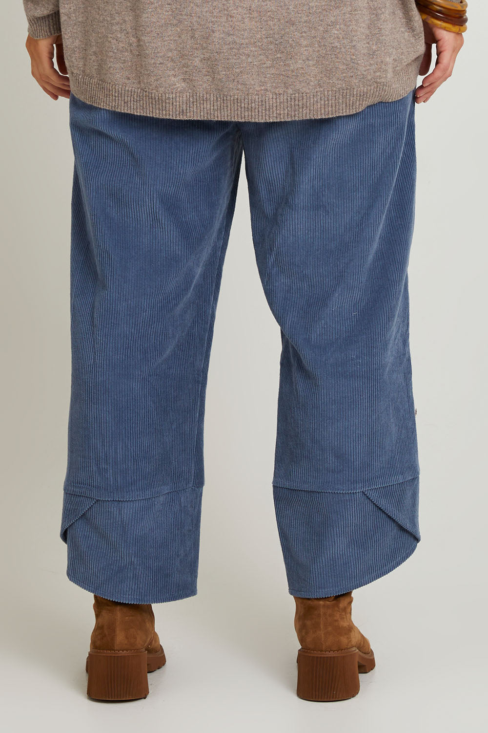 Model Laura wearing size 14 of the Ready For You Cord Pants in colour Blue (Blue), from the back