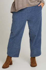 Model Laura wearing size 14 of the Ready For You Cord Pants in colour Blue (Blue), from the front, cropped image
