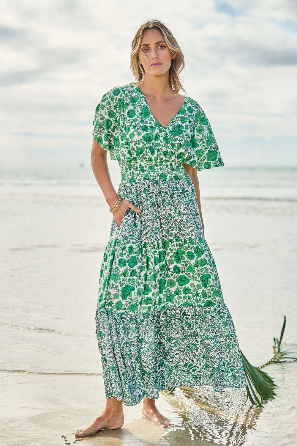 Model Tegan wearing size 10 of the Tiers Of Joy Maxi Dress in colour Greenfleur (Green), from the front, showing the whole outfit