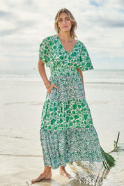 Model Tegan wearing size 10 of the Tiers Of Joy Maxi Dress in colour Greenfleur (Green), from the front, showing the whole outfit