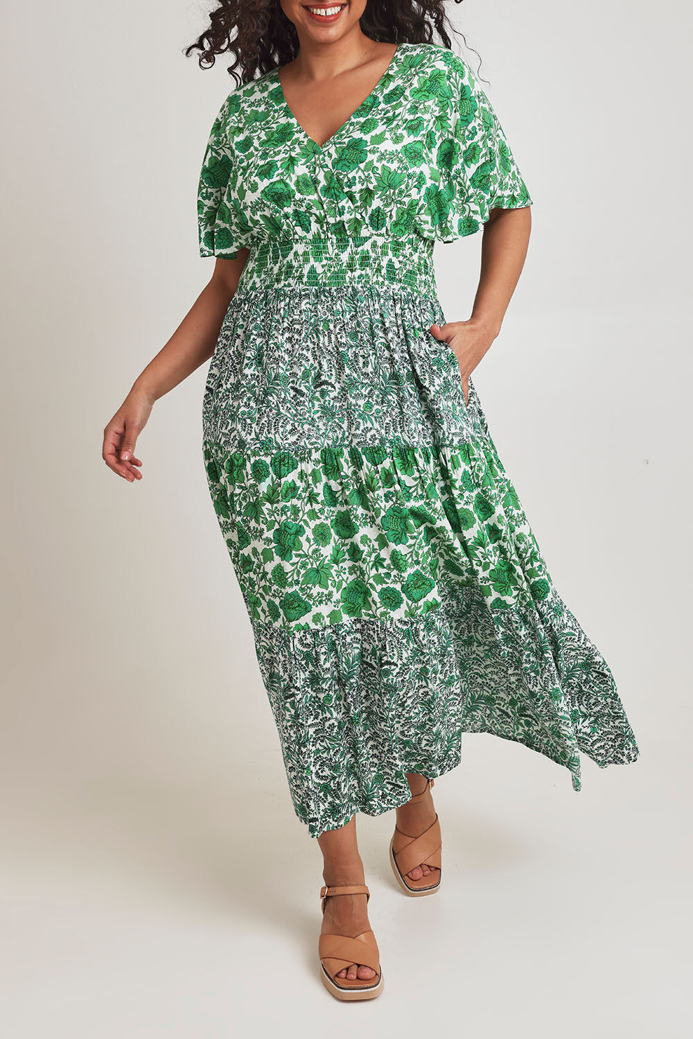 Model Terri-Leigh wearing size 14 of the Tiers Of Joy Maxi Dress in colour Greenfleur (Green), from the front, cropped image