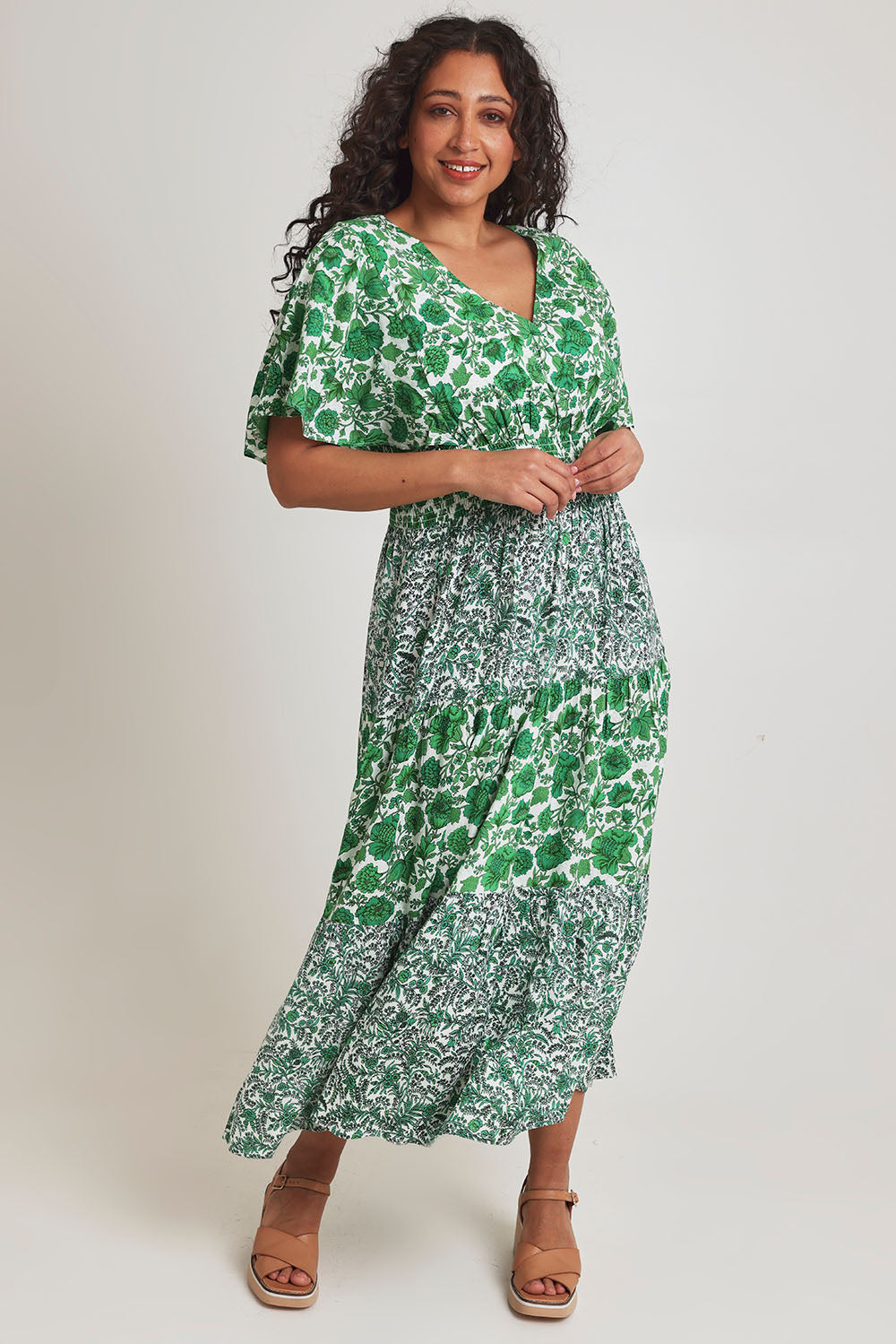 Model Terri-Leigh wearing size 14 of the Tiers Of Joy Maxi Dress in colour Greenfleur (Green), from the front, showing the whole outfit