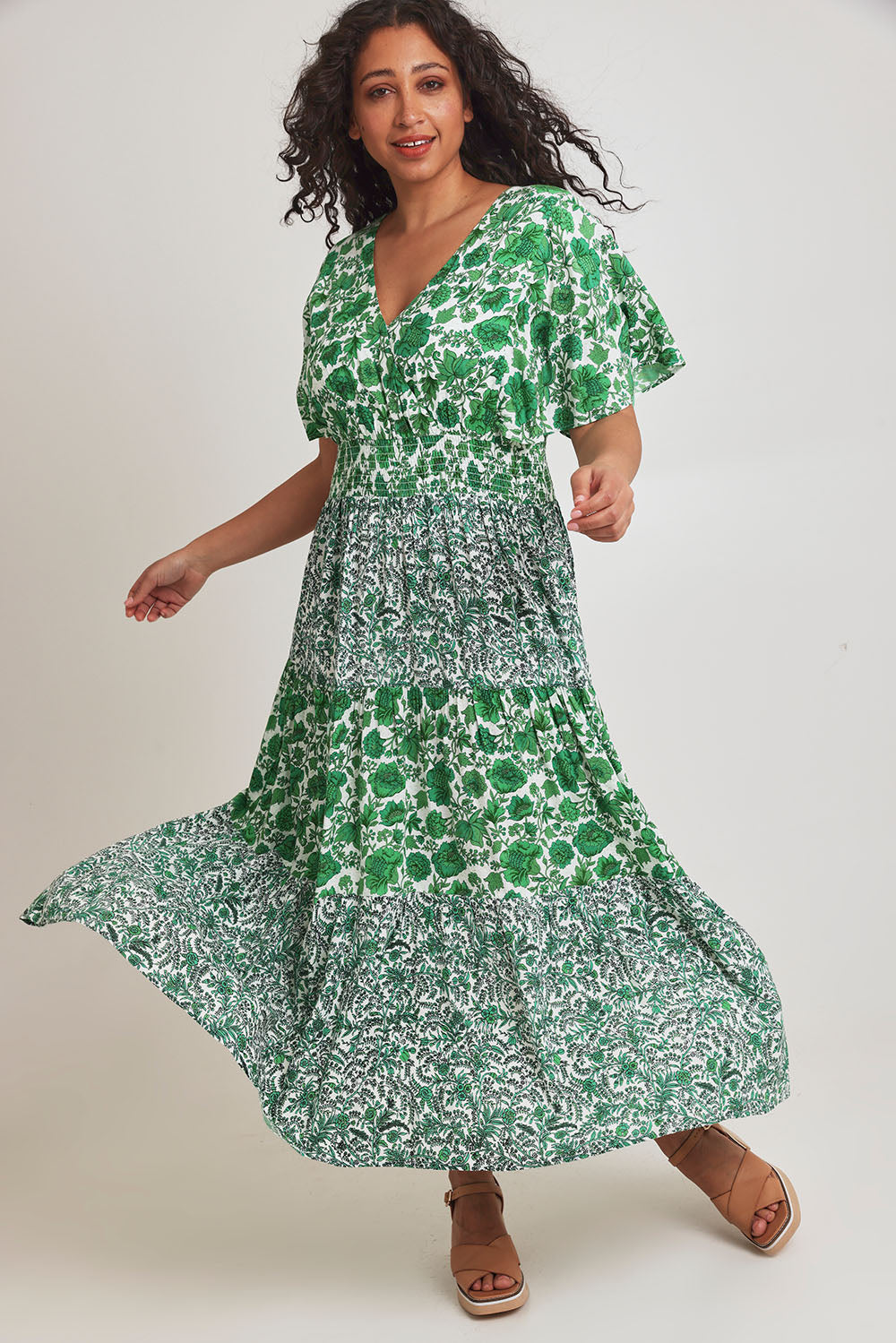 Model Terri-Leigh wearing size 14 of the Tiers Of Joy Maxi Dress in colour Greenfleur (Green), from the front, showing the whole outfit