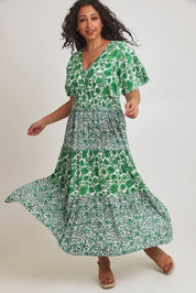 Model Terri-Leigh wearing size 14 of the Tiers Of Joy Maxi Dress in colour Greenfleur (Green), from the front, showing the whole outfit
