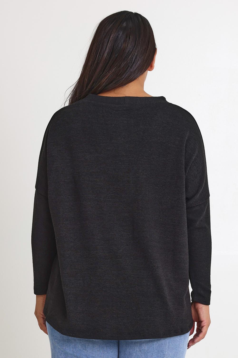 Model Ashleigh wearing size 16 of the My Boyfriends Slouch Cardi in colour Black (Black), from the front, cropped image