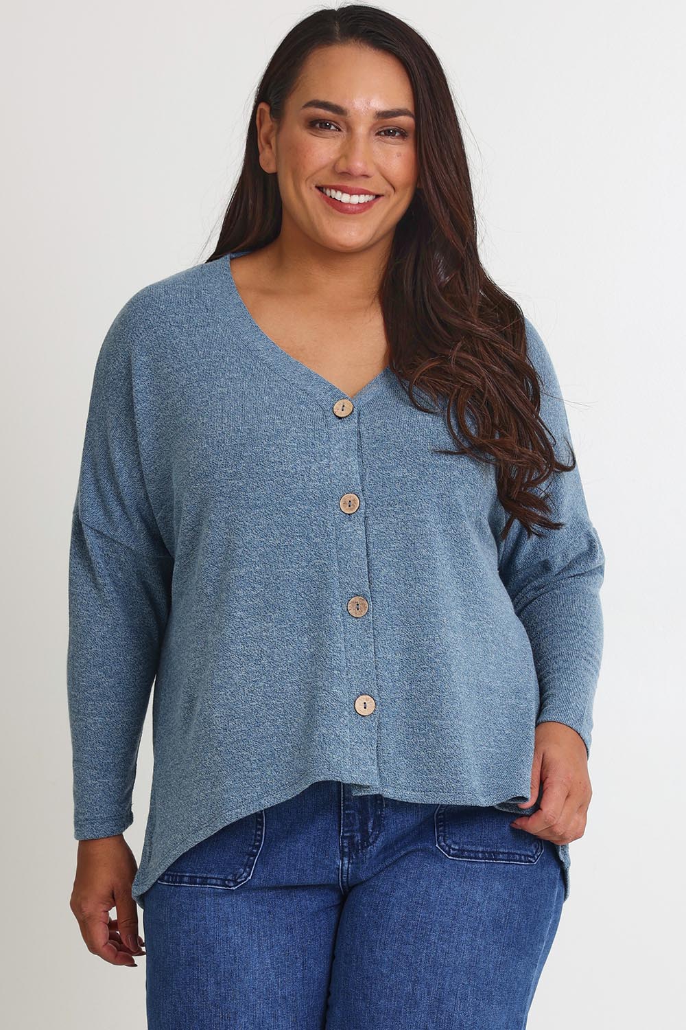 Model Ashleigh wearing size 16 of the My Boyfriends Slouch Cardi in colour Denim (Blue), from the front, cropped image
