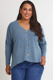 Model Ashleigh wearing size 16 of the My Boyfriends Slouch Cardi in colour Denim (Blue), from the front, cropped image