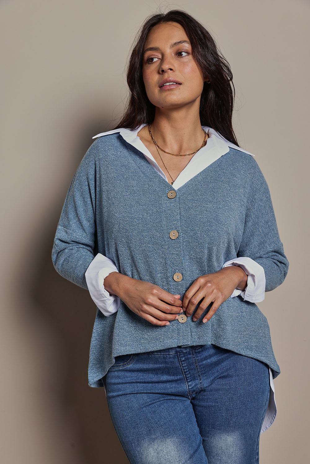 Model Tahnee wearing size 10 of the My Boyfriends Slouch Cardi in colour Denim (Blue), from the front, cropped image