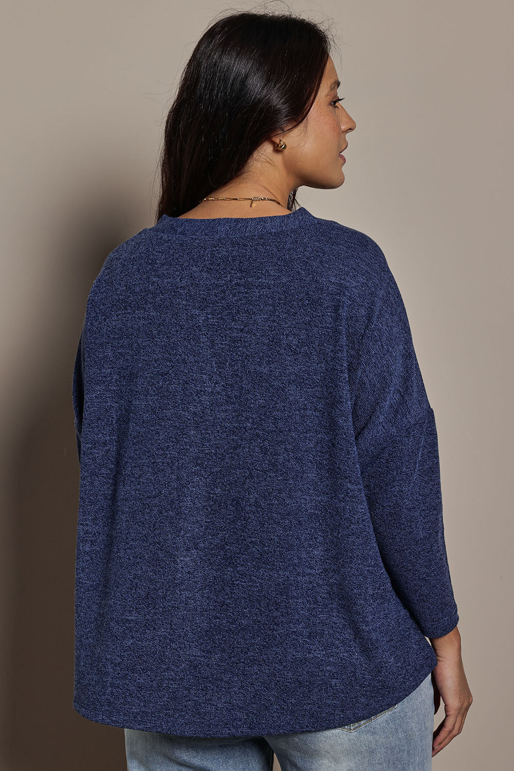 Model Tahnee wearing size 10 of the My Boyfriends Slouch Cardi in colour Indigo (Blue), from the back