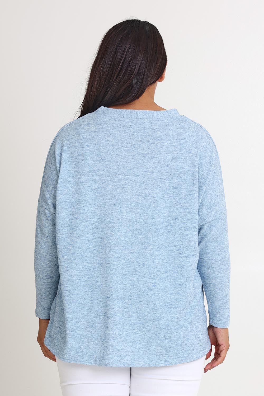 Model Ashleigh wearing size 16 of the My Boyfriends Slouch Cardi in colour Skymarl (Blue), from the back