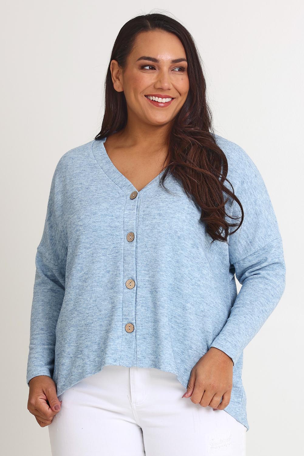 Model Ashleigh wearing size 16 of the My Boyfriends Slouch Cardi in colour Skymarl (Blue), from the front, cropped image