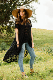 Model Ilona wearing size 10 of the Walking On Clouds Jacquard Top in colour Black (Black), from the front, showing the whole outfit