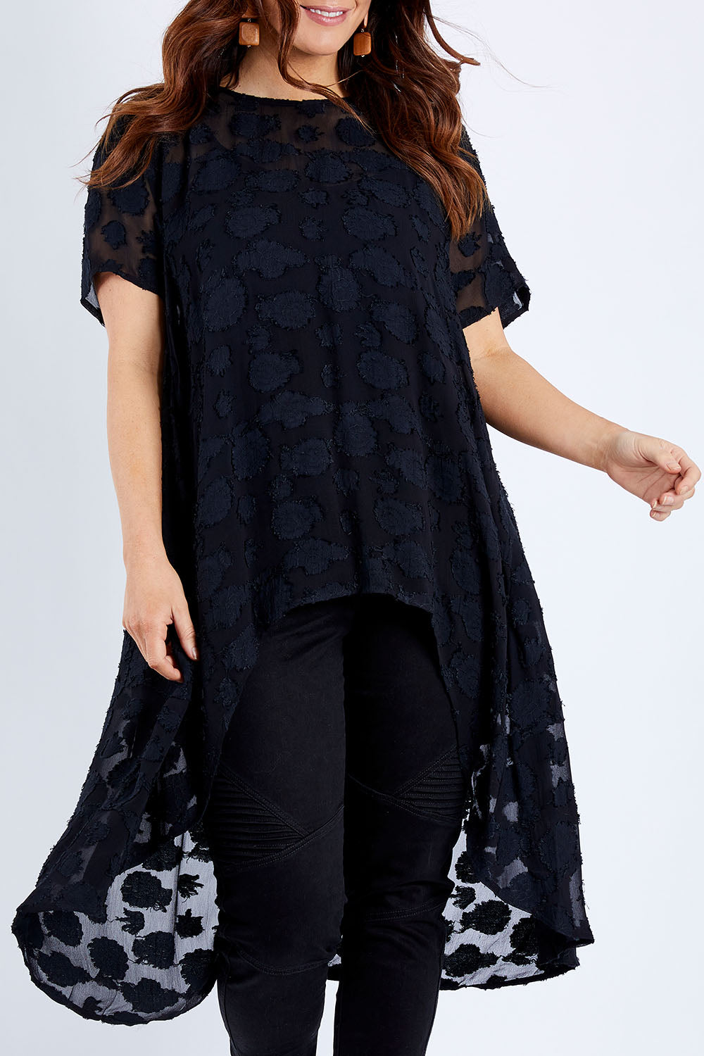 Model Laura wearing size 14 of the Walking On Clouds Jacquard Top in colour Black (Black), from the front, cropped image