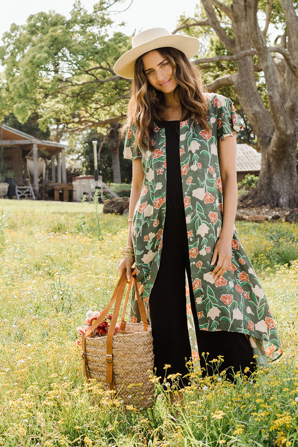 Model Ilona wearing size 10 of the My Heart Is Full Dress in colour Khaki (Green), from the front, showing the whole outfit