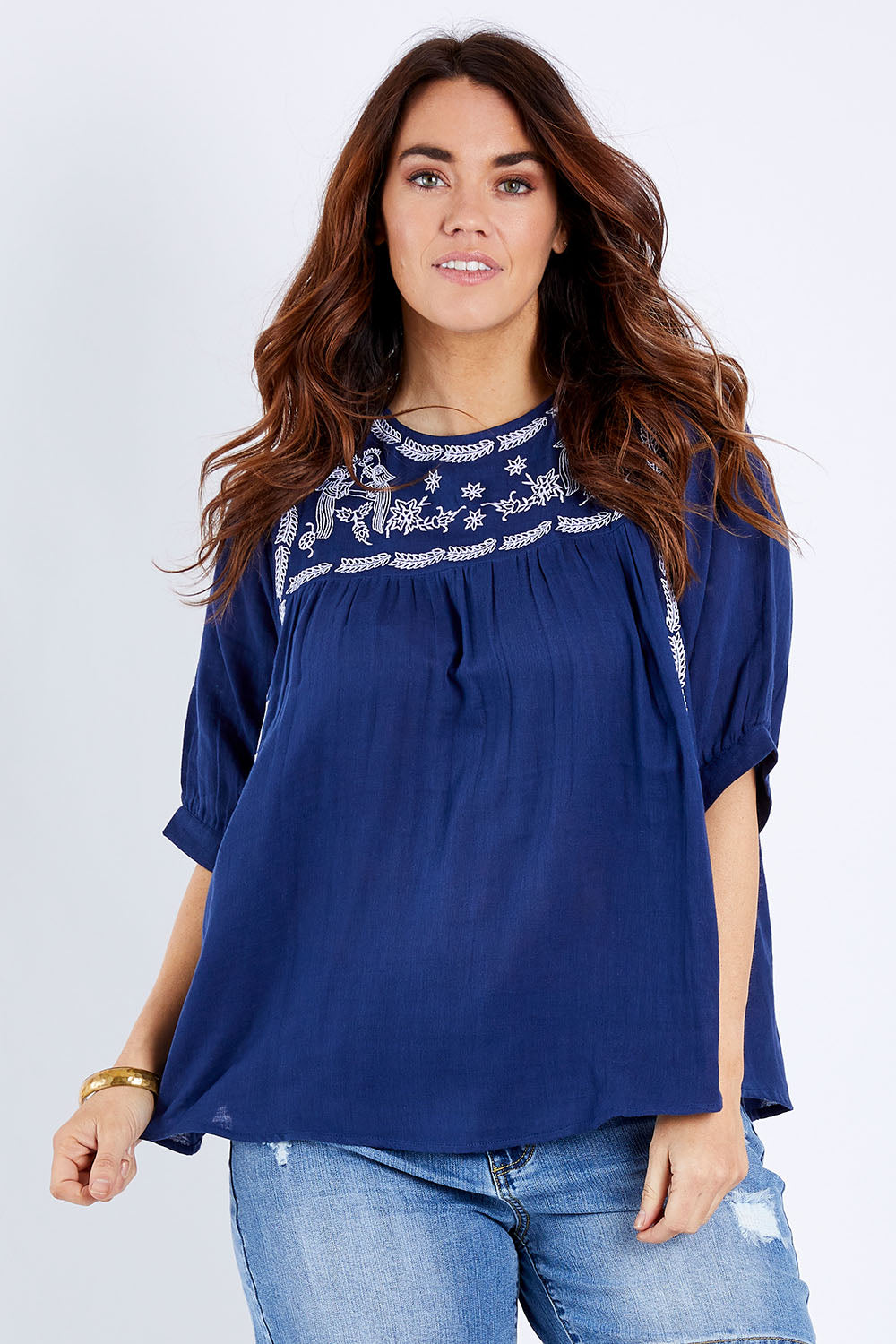 Model Laura wearing size 14 of the Secret Garden Cotton Blouse in colour Deepblue (Blue), from the front, cropped image