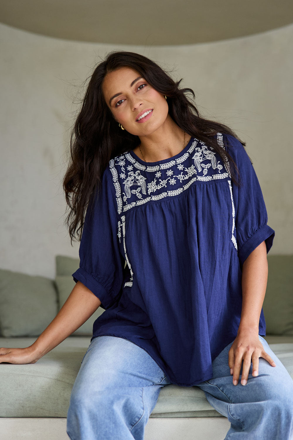 Model Tahnee wearing size 10 of the Secret Garden Cotton Blouse in colour Deepblue (Blue), from the front, showing the whole outfit