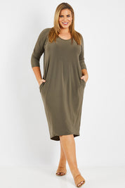 Model Fiona wearing size 16 of The Wanderer In Me Travel Dress in colour Khaki (Green), from the front, showing the whole outfit