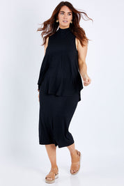 Model Laura wearing size 14 of the Softly Swinging Bamboo Singlet in colour Black (Black), from the front, showing the whole outfit