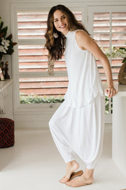 Model Ilona wearing size 10 of the Softly Swinging Bamboo Singlet in colour White (White), from the front, showing the whole outfit