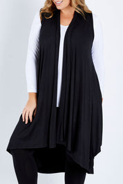 Model Fiona wearing size 16 of the Softly Swinging Bamboo Vest in colour Black (Black), from the front, cropped image