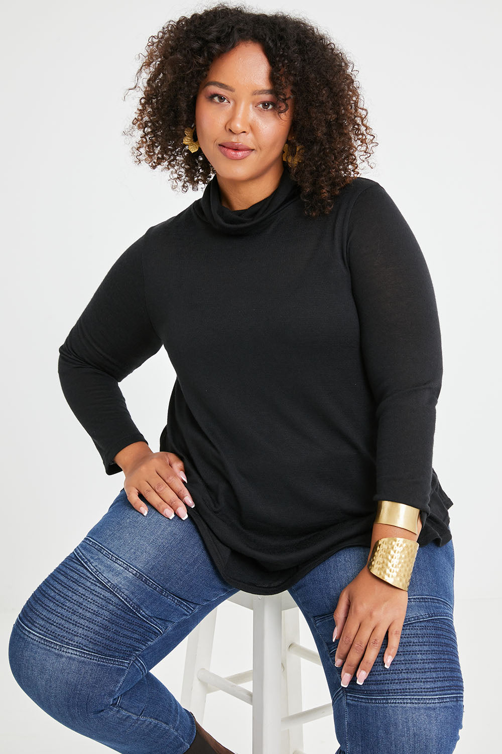 Model Alexis wearing size 16 of the Falling For You Skivvy Tunic in colour Black (Black), from the front, cropped image