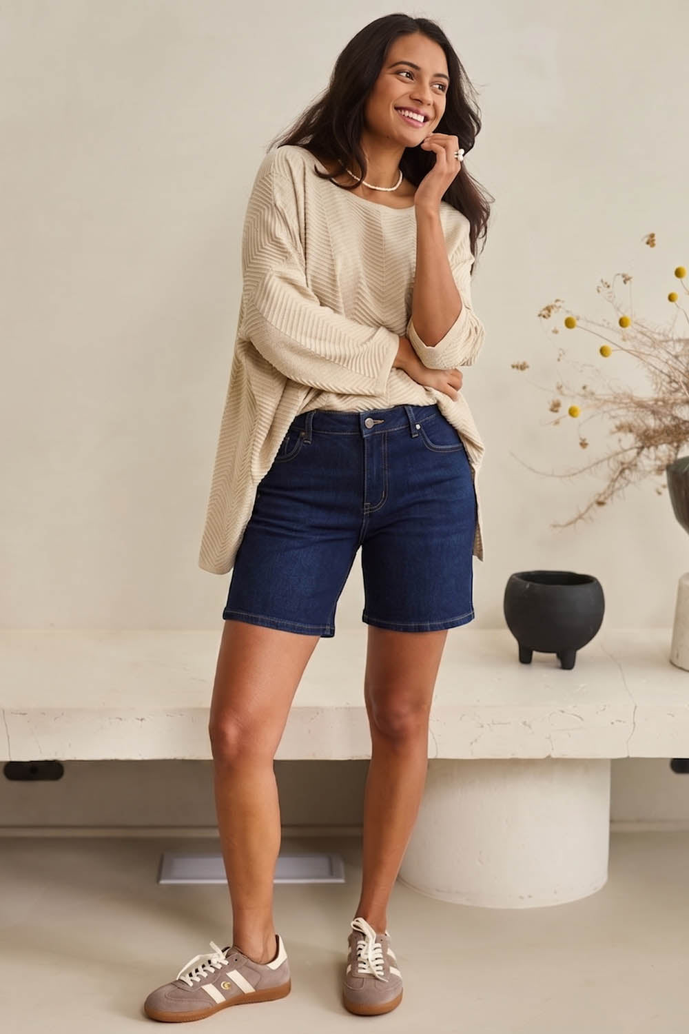 Model Tahneei wearing size 10 of the Youre Always There For Me Plain Boyfriend Shorts – Darkdenim in colour Darkdenim, from the front