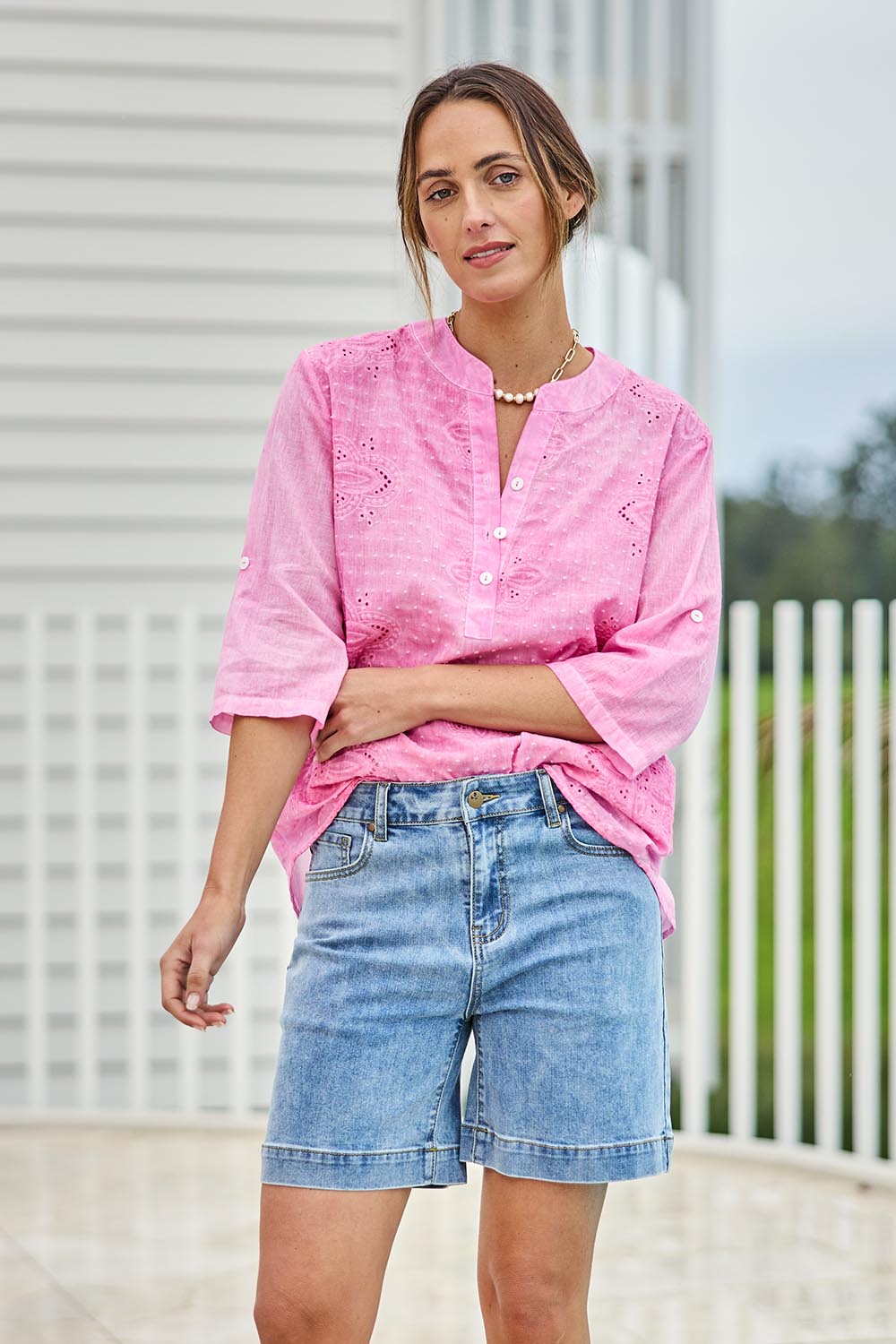 Model Tegand wearing size 10 of the Youre Always There For Me Plain Boyfriend Shorts – Denim in colour Denim, in a cropped view