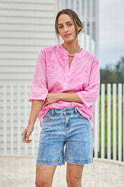 Model Tegand wearing size 10 of the Youre Always There For Me Plain Boyfriend Shorts – Denim in colour Denim, in a cropped view