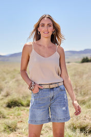 Model Tegand wearing size 10 of the Youre Always There For Me Boyfriend Shorts - Denim in colour Denim, in a cropped view