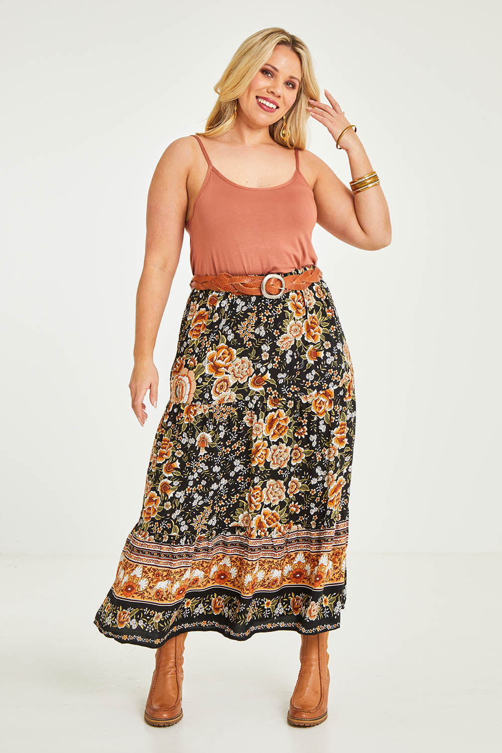 Model Katie wearing size 16 of the Softly Swinging Bamboo Scoop Singlet in colour Copper, from the front, showing the whole outfit